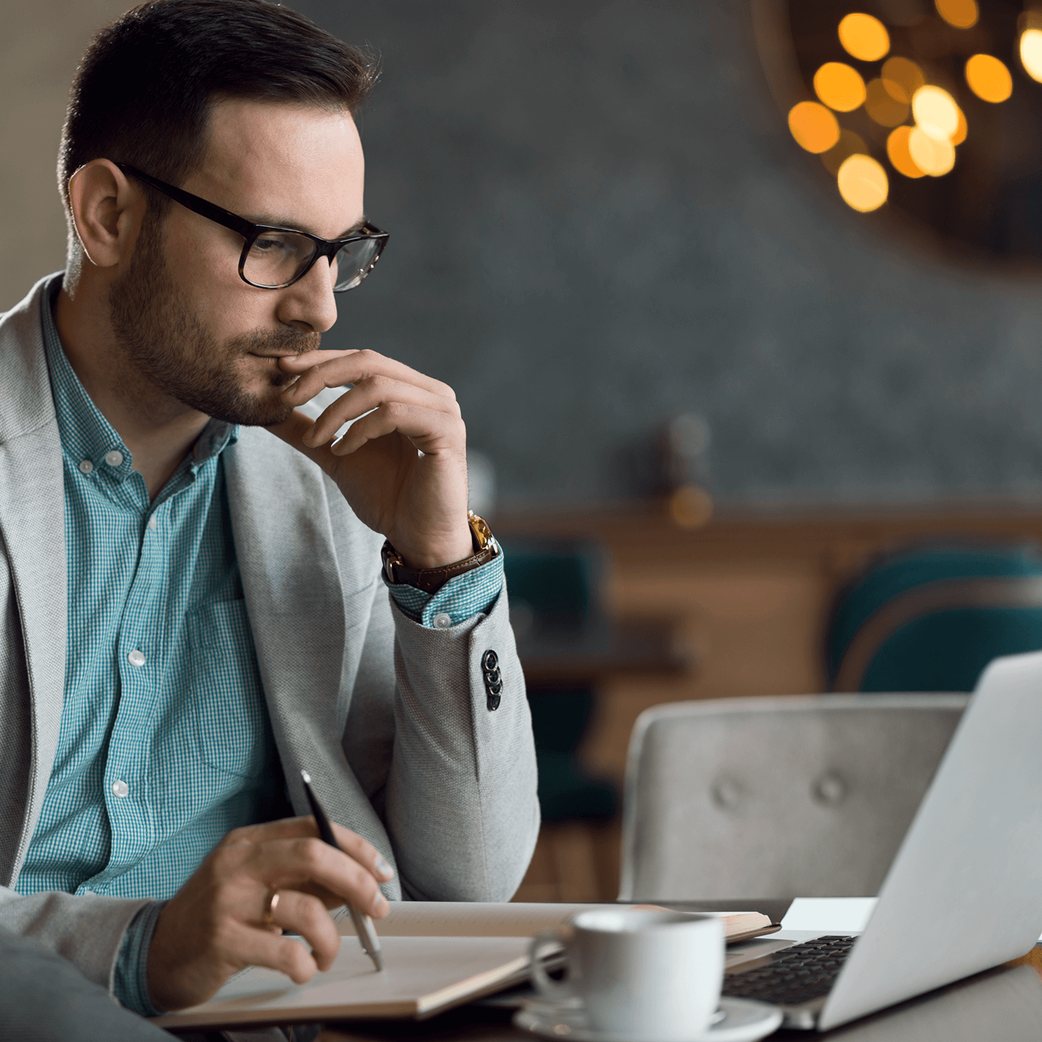 Man carrying out KYC on his computer.